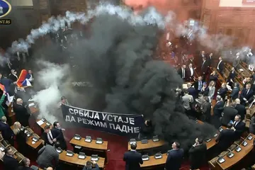 Chaos Erupts in Serbian Parliament as Opposition Sets Off Smoke Grenades in Protest