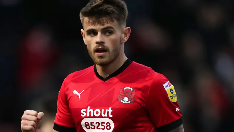 Kelman’s Hot Streak Fuels Orient’s Charge in League One Betting Frenzy